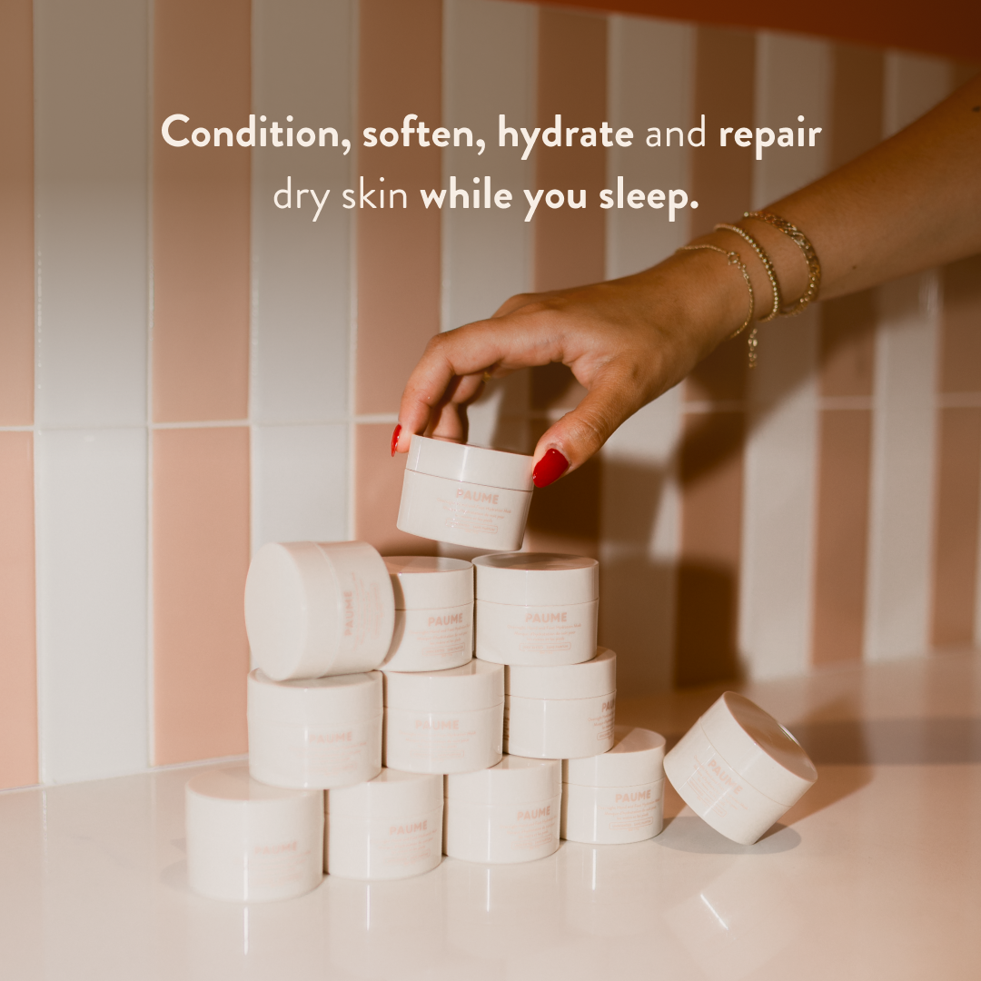 Hand reaching for PAUME Overnight Hand & Foot Hydration Mask on a striped background with text about skin care.