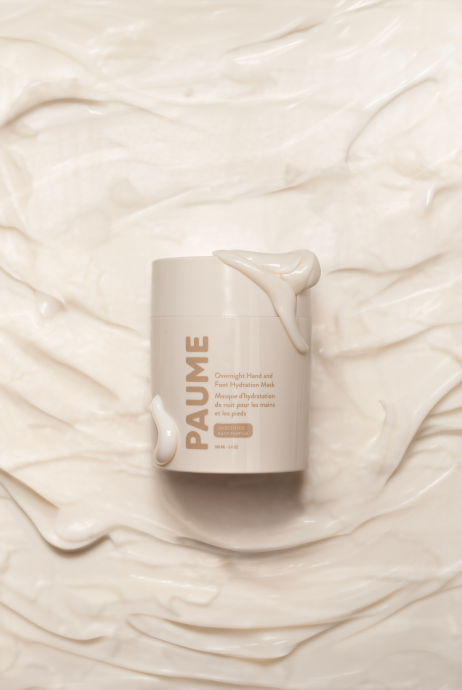PAUME Overnight Hand & Foot Hydration Mask skincare product on a textured beige background