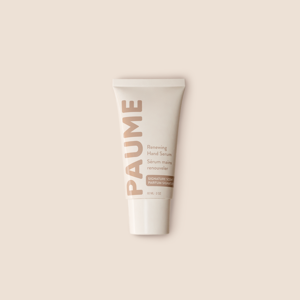 PAUME hand serum tube on a beige background