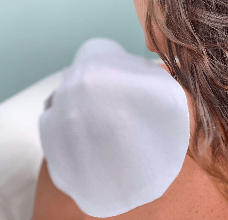 Person using Wildpier Exfoliating Glove with a blurred background