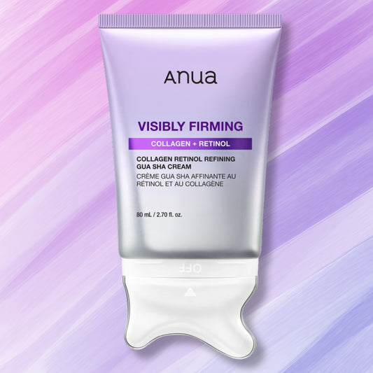 Anua Visibly Firming Collagen + Retinol Gua Sha Cream in a metallic silver squeeze tube with a white spatula applicator, set against a purple and lavender diagonal striped background.