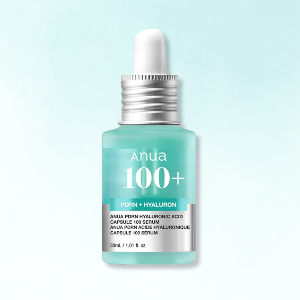 Anua 100+ PORN + HYALURON capsule serum in a light aqua dropper bottle with a silver cap, centered on a pale blue gradient background.