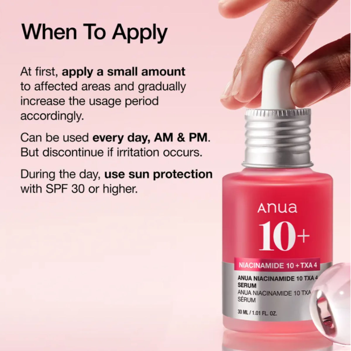 Anua 10+ Niacinamide 10% Serum in a pink bottle with a white dropper cap, shown with a hand holding the dropper against a pink background with application instructions.