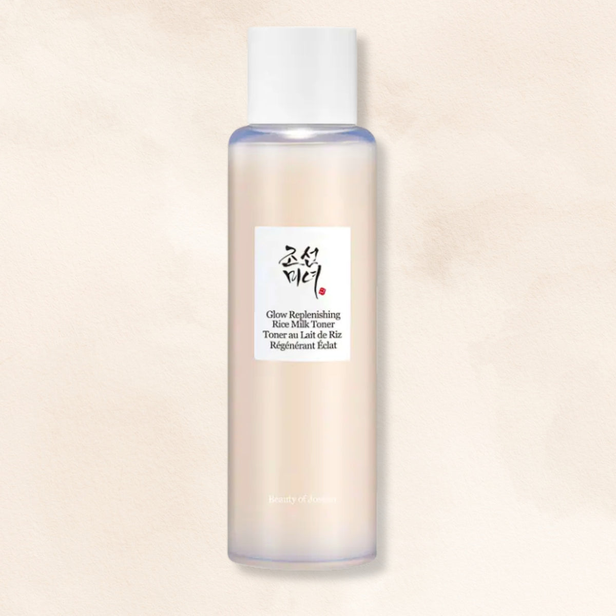 Beauty of Joseon Glow Replenishing Rice Milk Toner in a translucent frosted bottle with a white cap, set against a warm beige textured background.