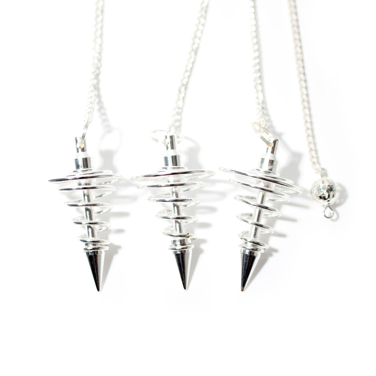 Silver Spiral Metal Pendulum shown in a group; sold individually