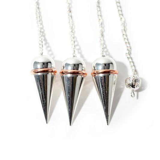 Silver Colour Metal Secret Chamber Point Pendulum with Copper Ring and Chain shown in a group; sold individually
