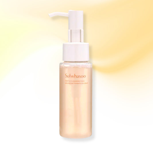 A bottle of Sulwhasoo soft, low-lather cleansing foam with a white pump dispenser, set against a soft yellow and white gradient background.