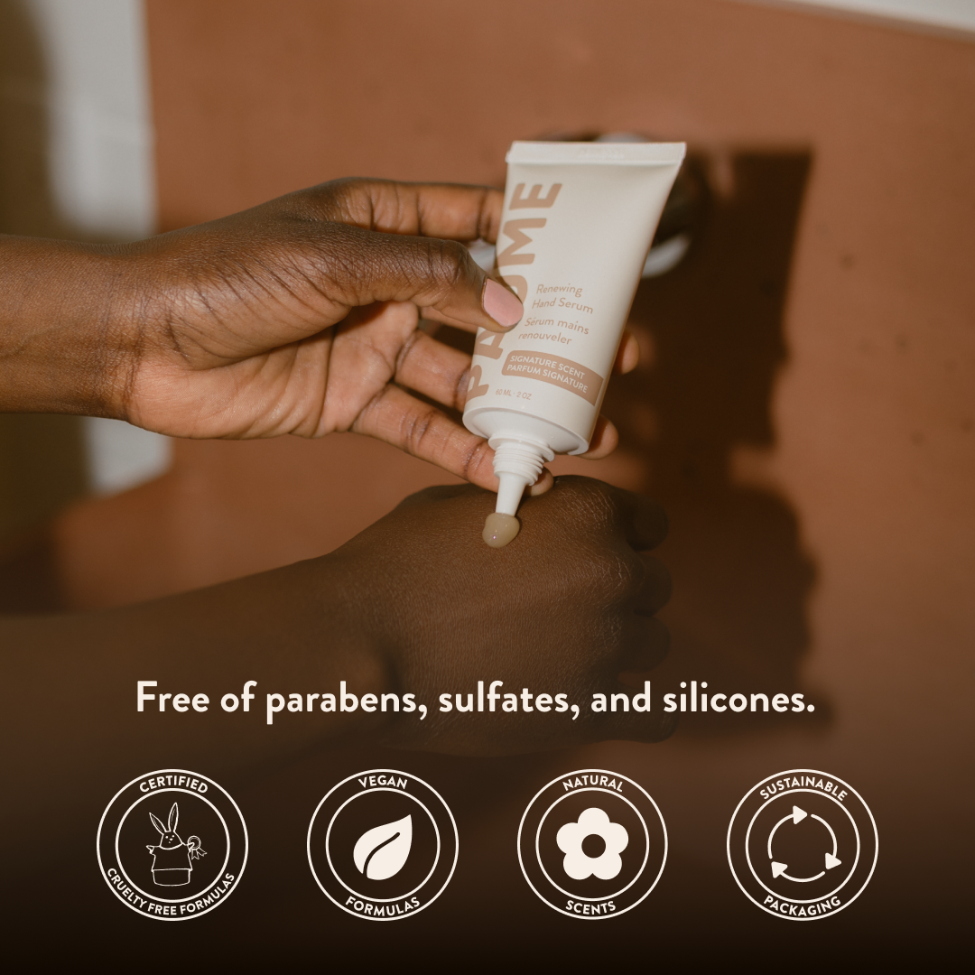 Hand applying a tube of cream to skin with product name PAUME displayed, set against a warm-toned background.