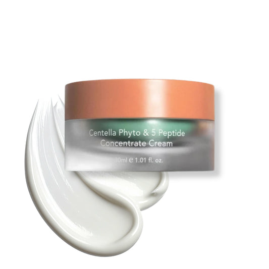 haruharu wonder - Centella Phyto & 5 Peptide Concentrate Cream in a frosted jar with a peach-colored lid, shown with a swirl of white cream on a white background.