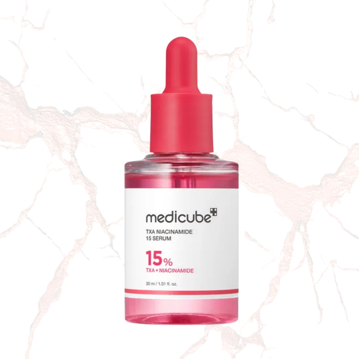 A 30 ml dropper bottle of medicube TXA Niacinamide 15 Serum, featuring a vibrant pink liquid inside a clear bottle with a bright pink dropper cap and a white label.