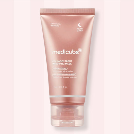 A tube of Medicube Collagen Night Wrapping Mask in a metallic rose gold color, set against a soft pink and white striped background.