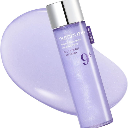 Numbuzin 9+ NAD+ PDRN Glow Boosting Toner in a translucent lavender bottle with a silver cap, set against a matching lavender cream swatch on a white background.