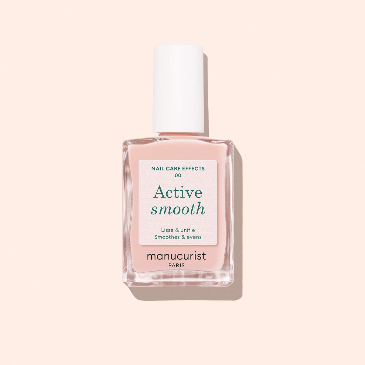 Manucurist Active Smooth 00 15 mL bottle on a pale peach background